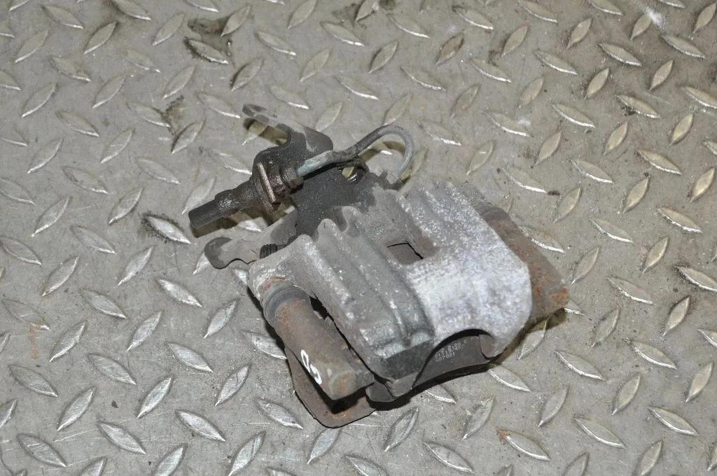 Rear brake caliper – right
