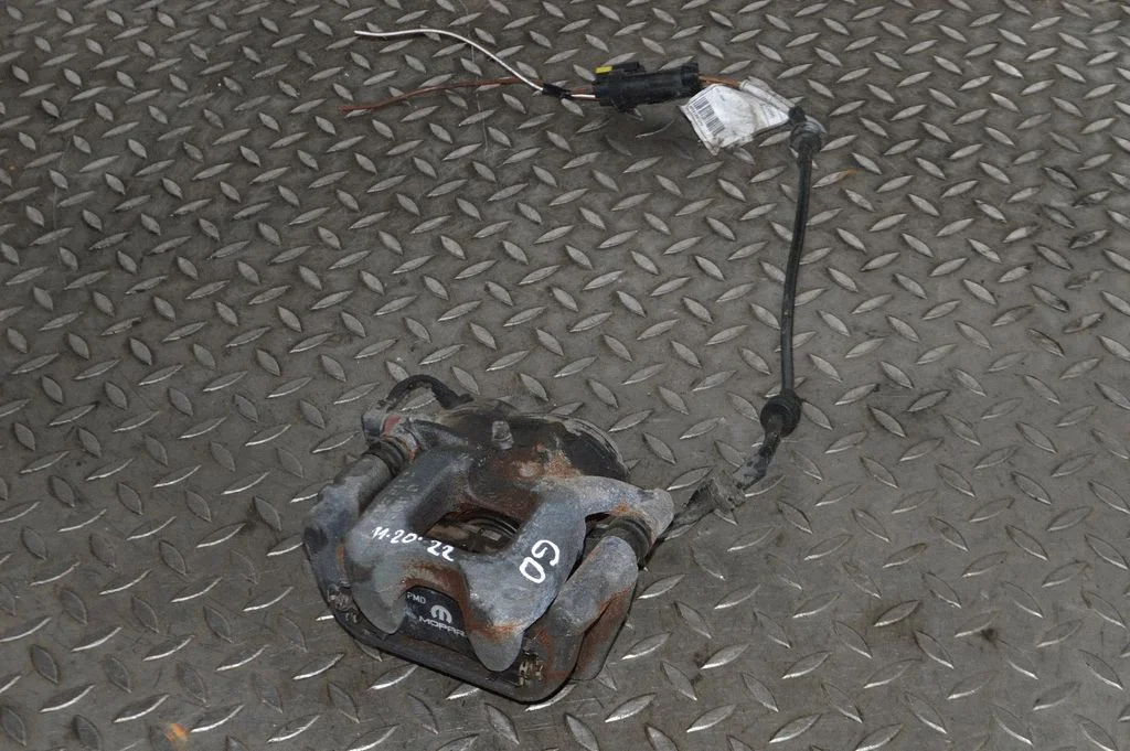 Rear brake caliper – right