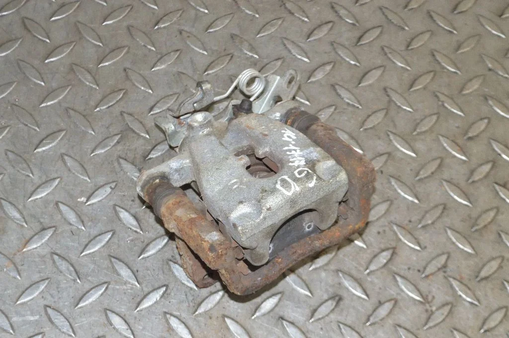 Rear brake caliper – right