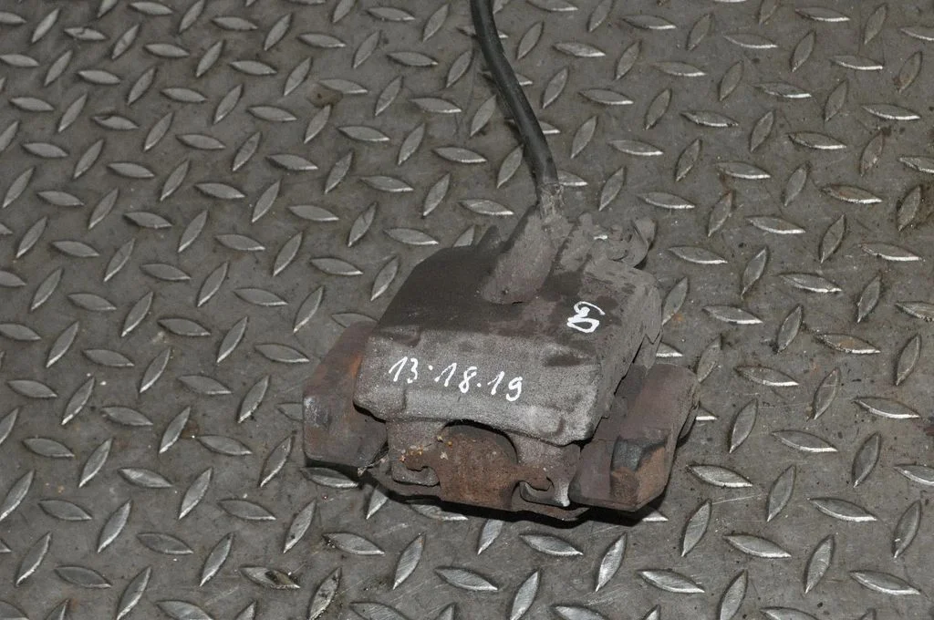 Rear brake caliper – right