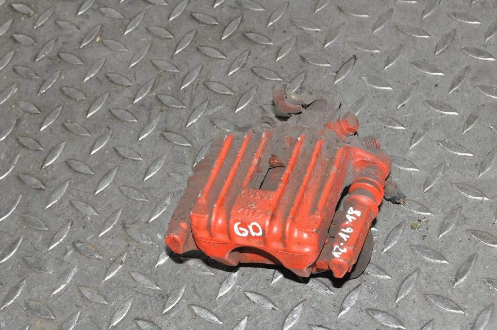 Rear brake caliper – right
