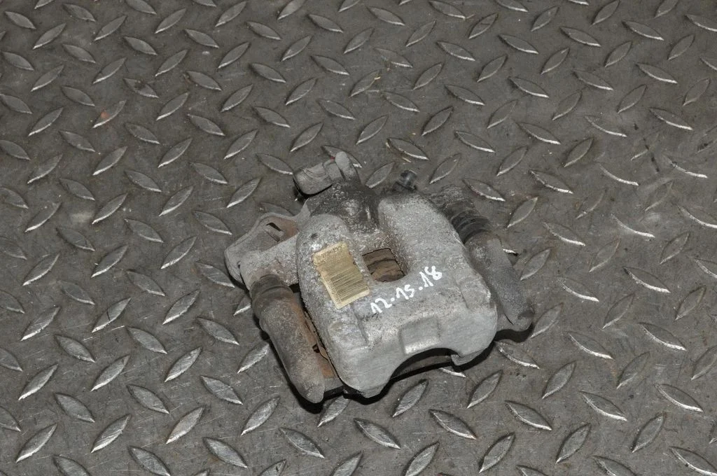 Rear brake caliper – right