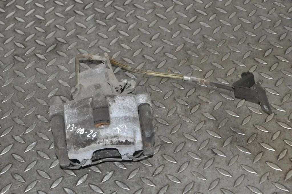 Rear brake caliper – right