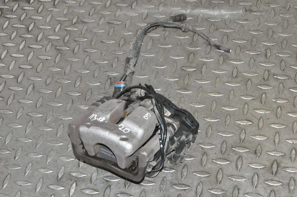 Rear brake caliper – right