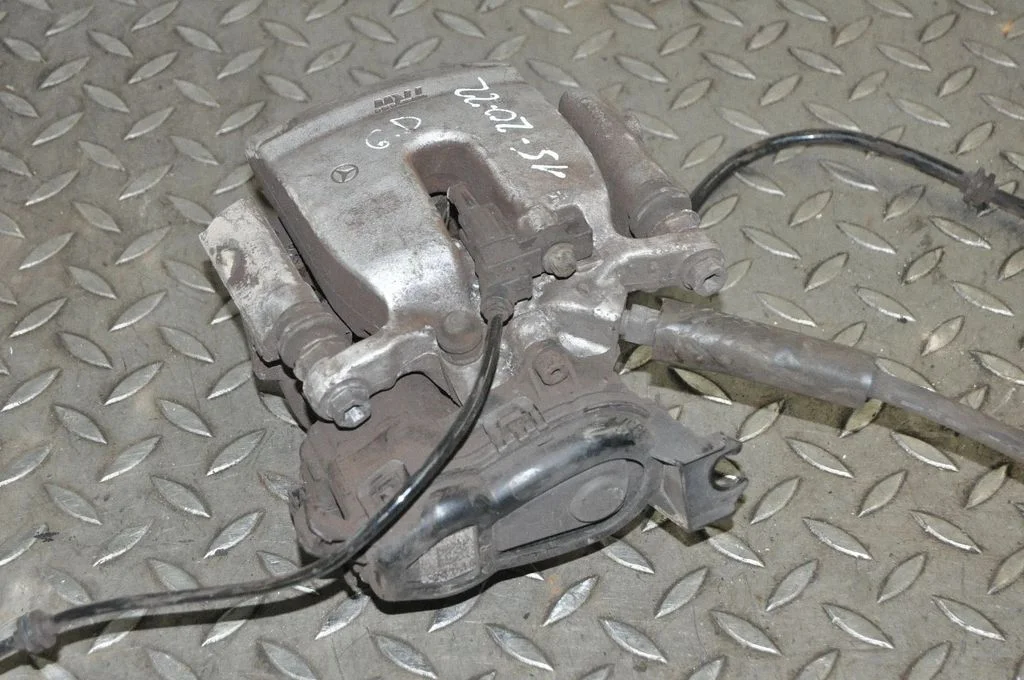 Rear brake caliper – right