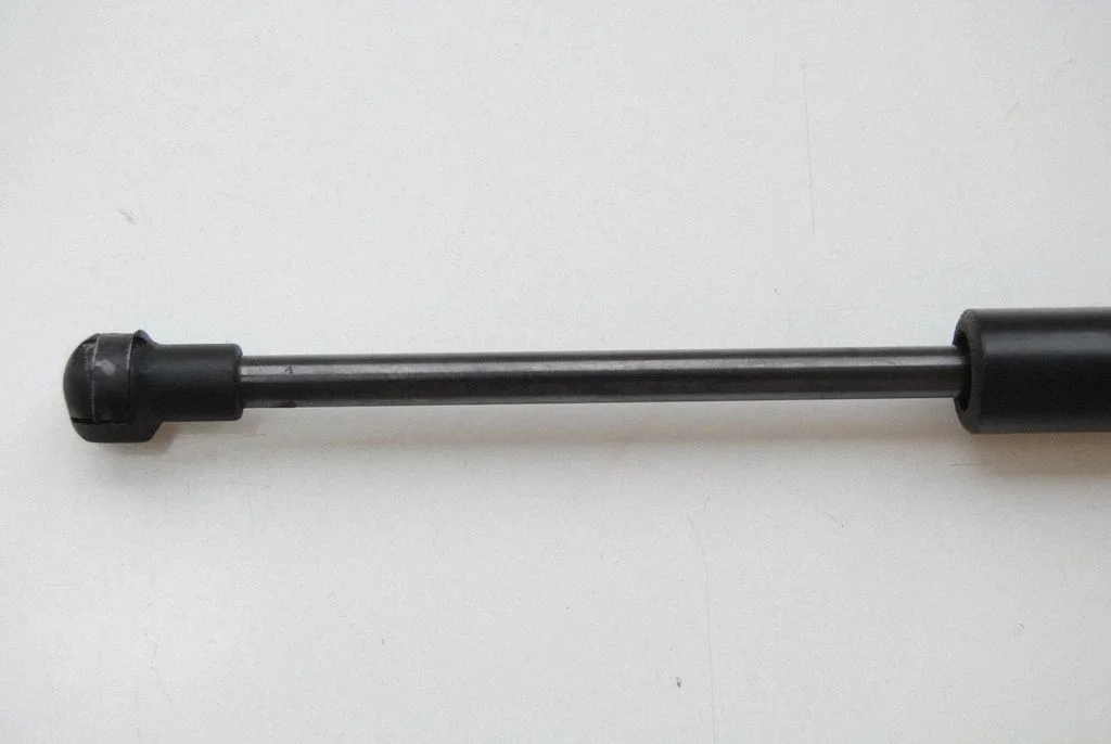 Aizmugurējā vāka amortizators 9542NX