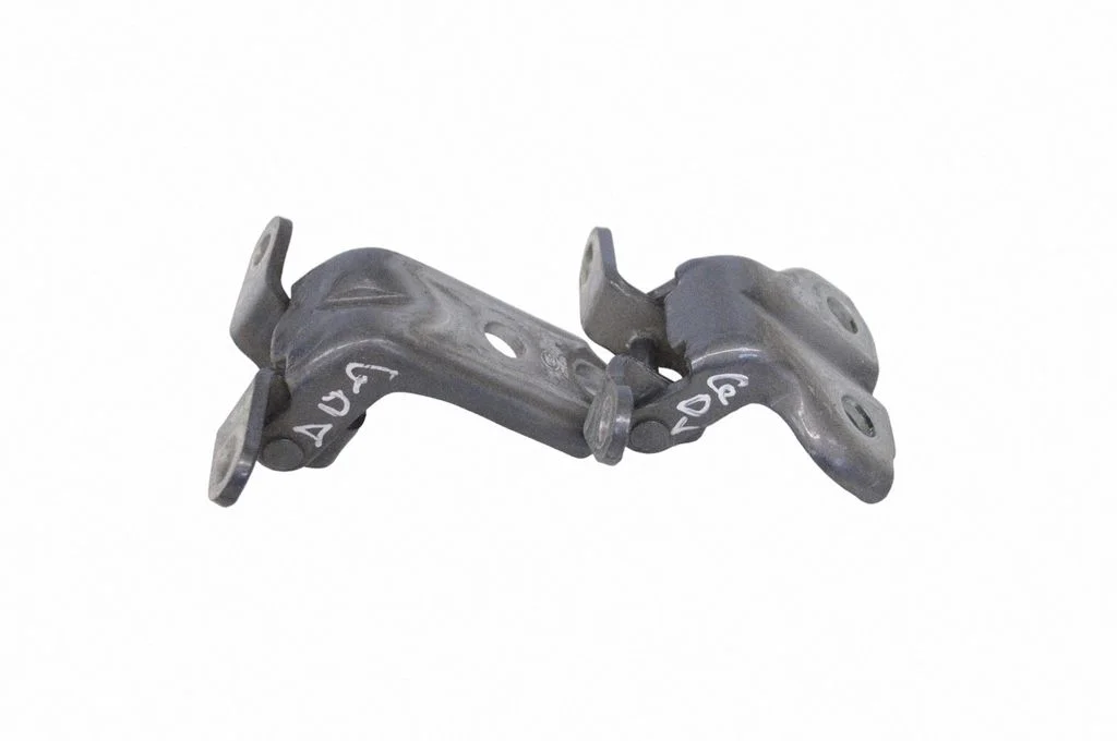 Rear door upper hinge – right