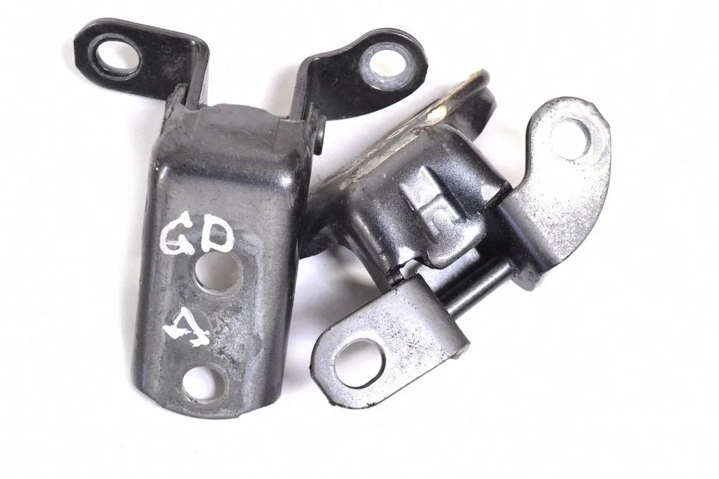 Rear door upper hinge – right