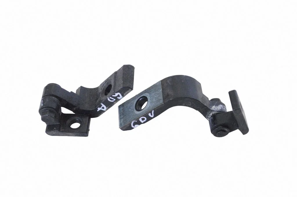 Rear door upper hinge – right