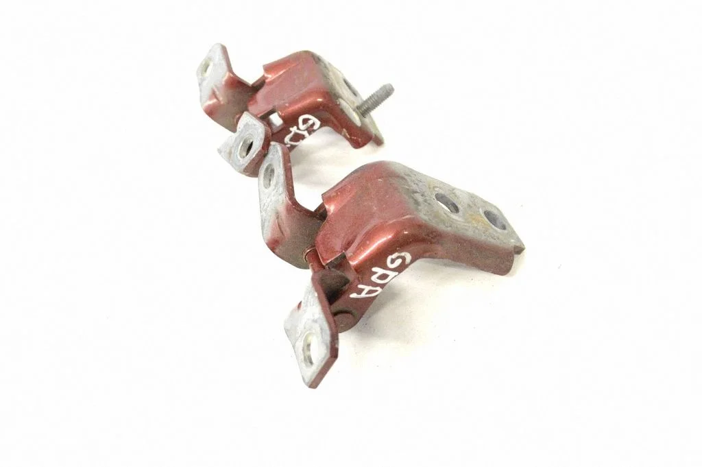 Rear door upper hinge – right