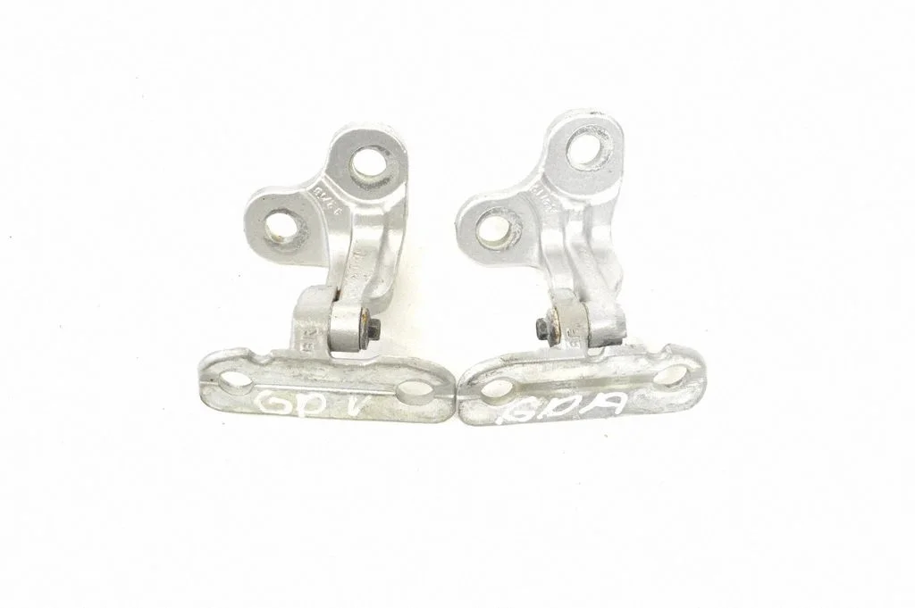 Rear door upper hinge – right