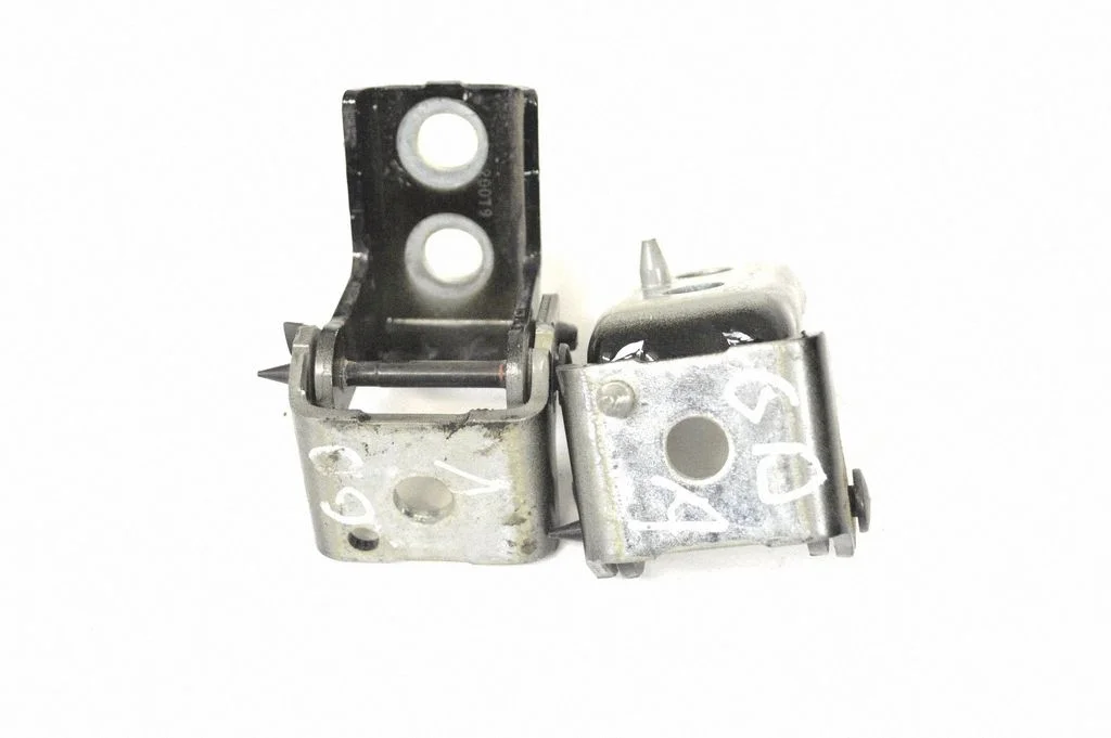 Rear door upper hinge – right