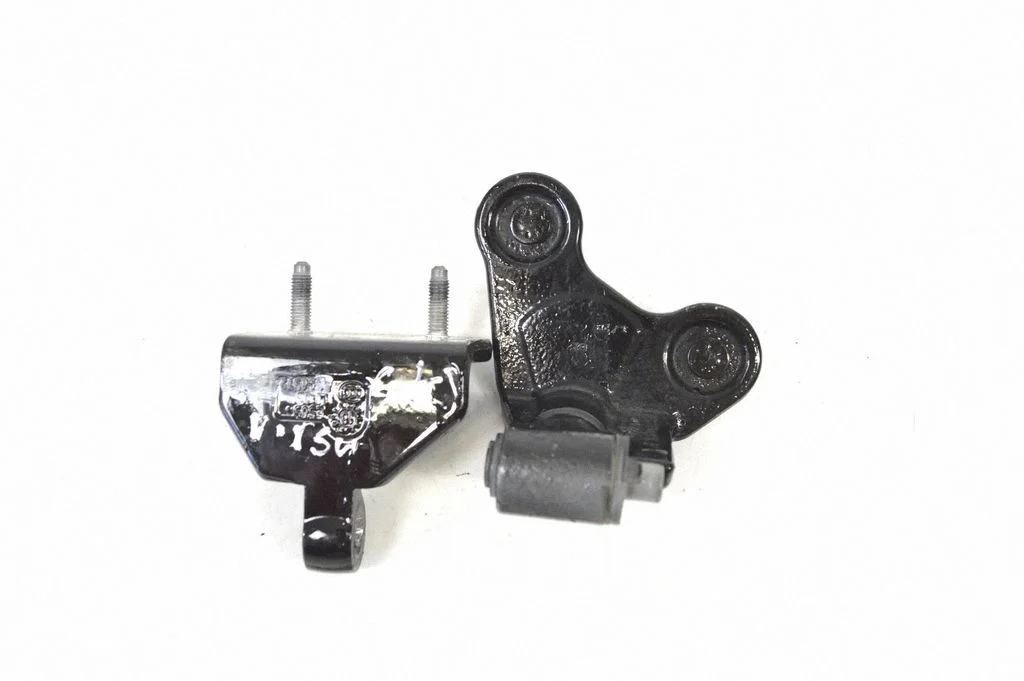 Rear door lower hinge – left