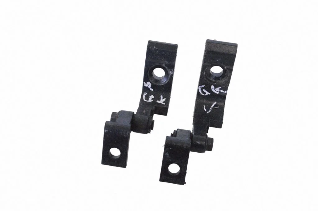 Rear door lower hinge – left