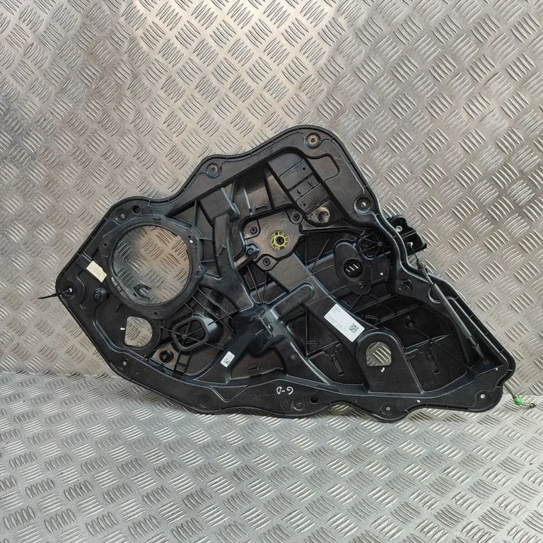 Aizmugurējā el. loga pacēlāja mehānisms bez motoriņa 1090053773