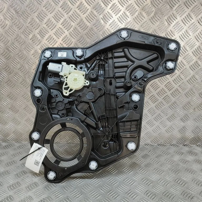 Aizmugurējā el. loga pacēlāja mehānisms bez motoriņa N1TB14A389AA