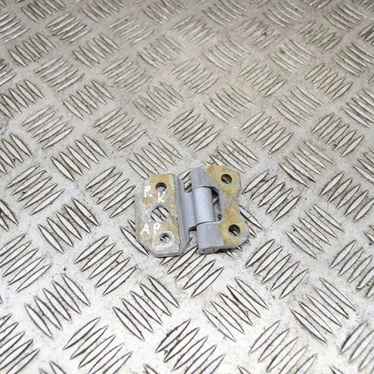 Front door upper hinge – left