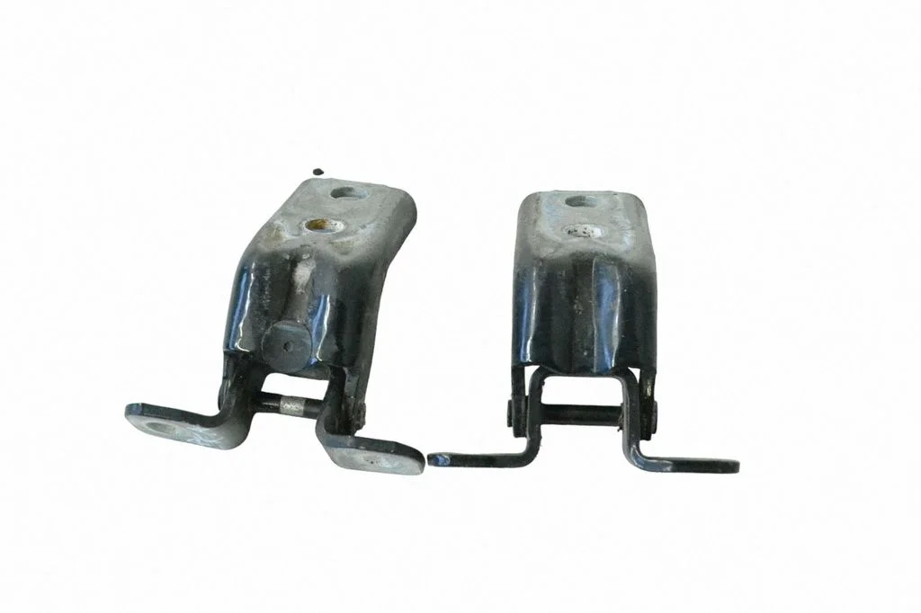 Front door upper hinge – left