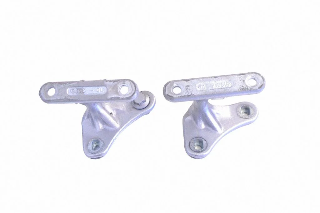 Front door upper hinge – left