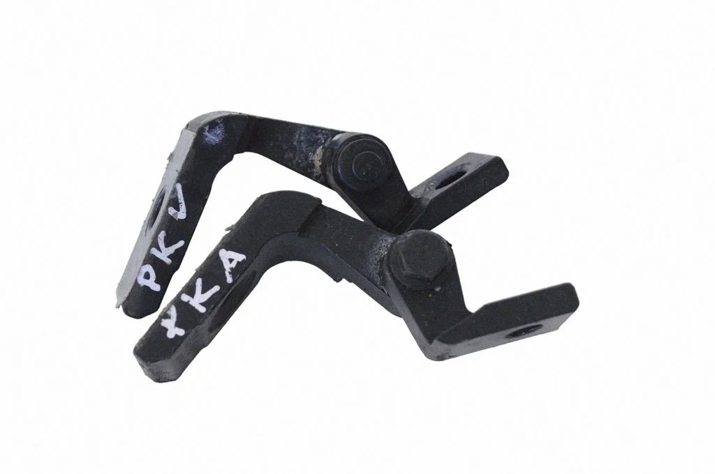 Front door upper hinge – left