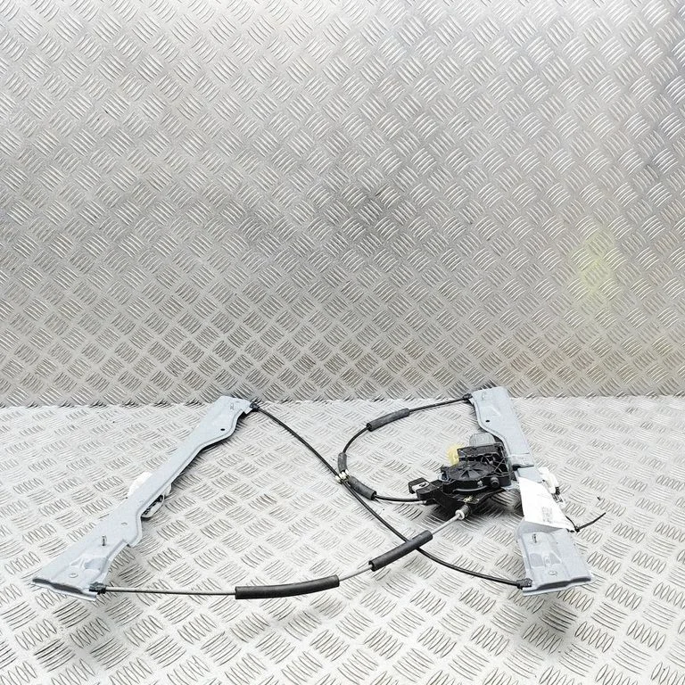 Priekšējā el. loga pacēlāja mehānisma komplekts FL3Z1523200H