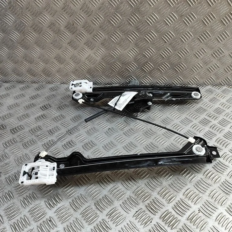 Front door window regulator with motor 7473088