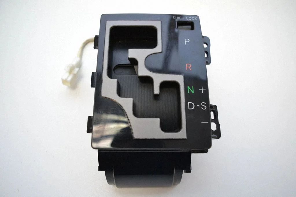 Gear shifter surround trim plastic