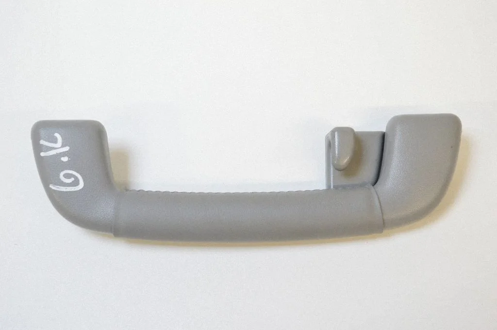 Rear interior roof grab handle – left