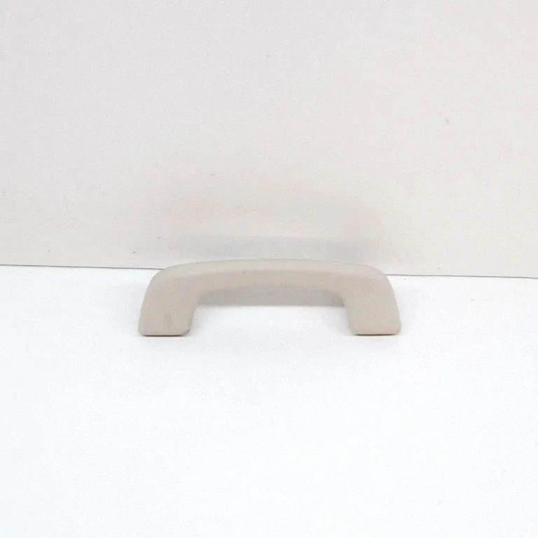 Front interior roof grab handle – left
