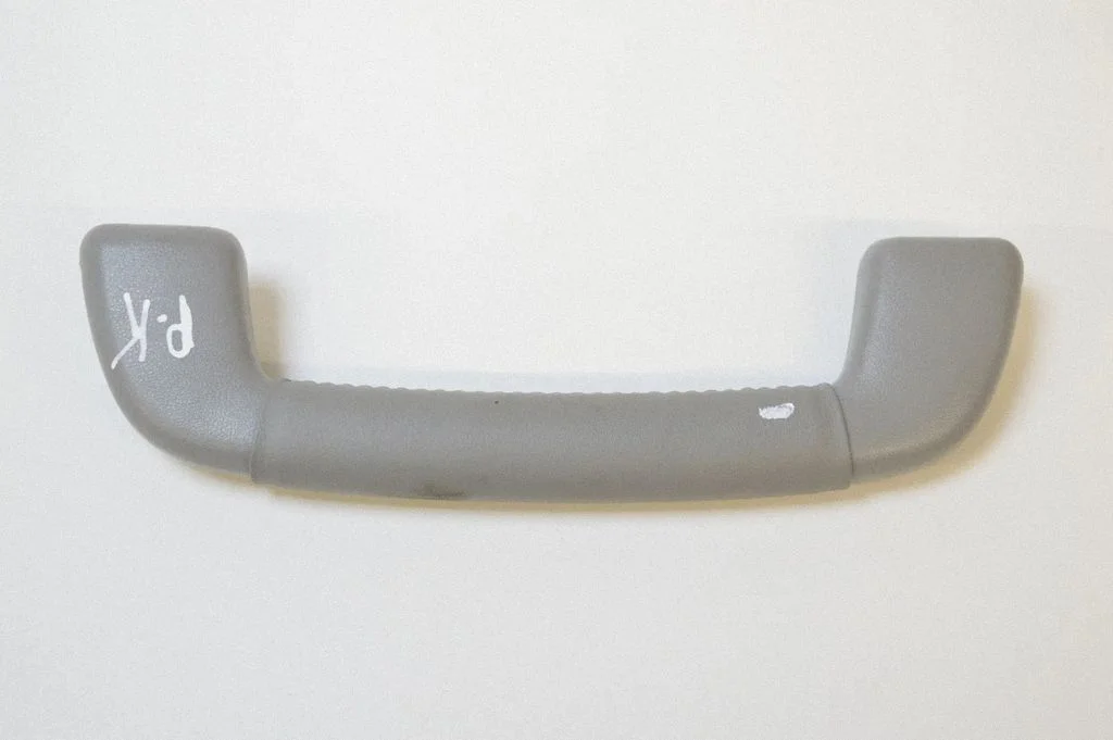 Front interior roof grab handle – left