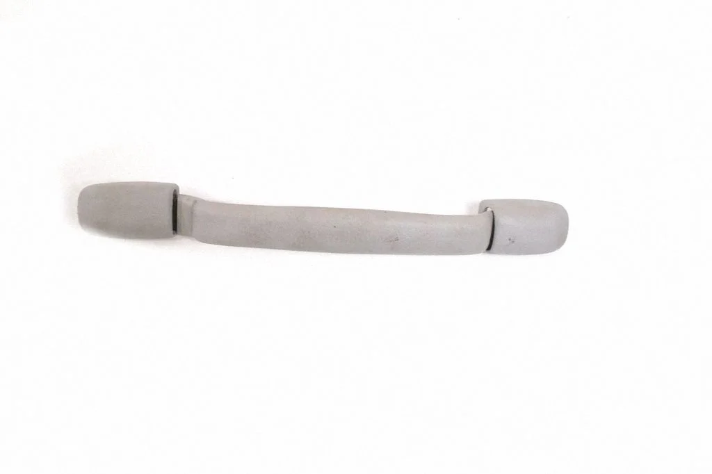 Front interior roof grab handle – left