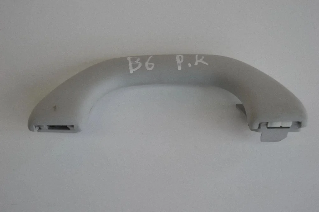 Front interior roof grab handle – left