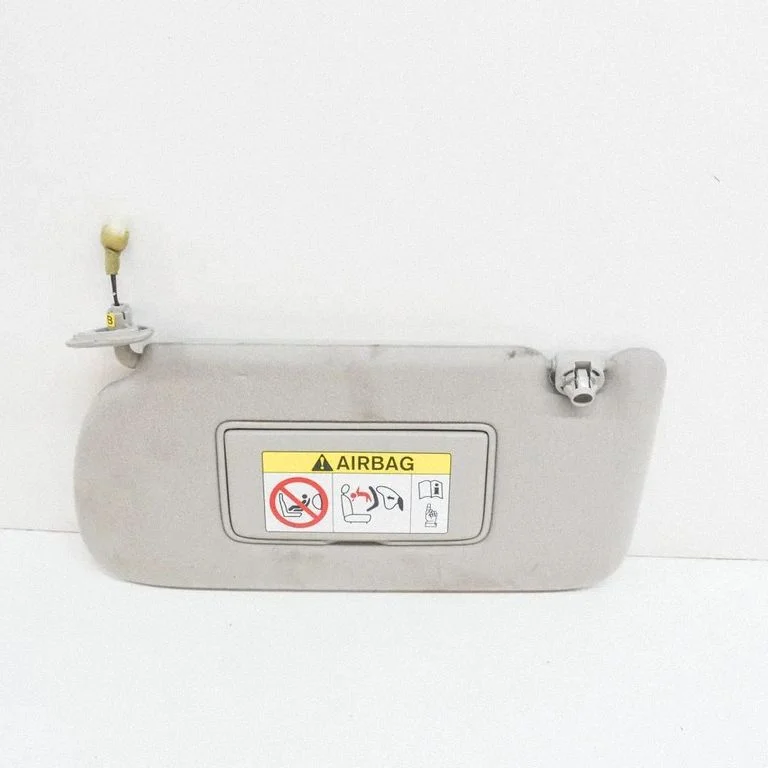 Sun visor – left