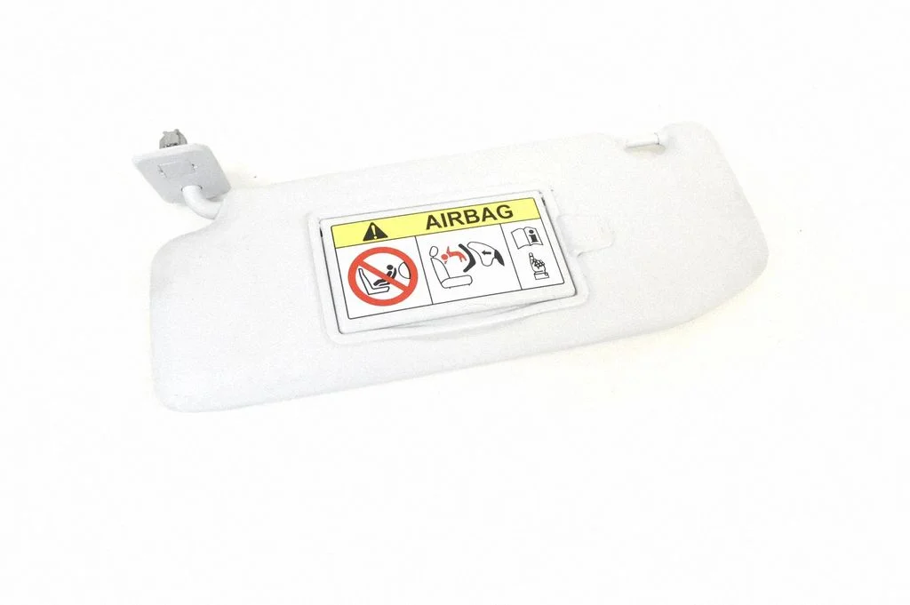 Sun visor – left
