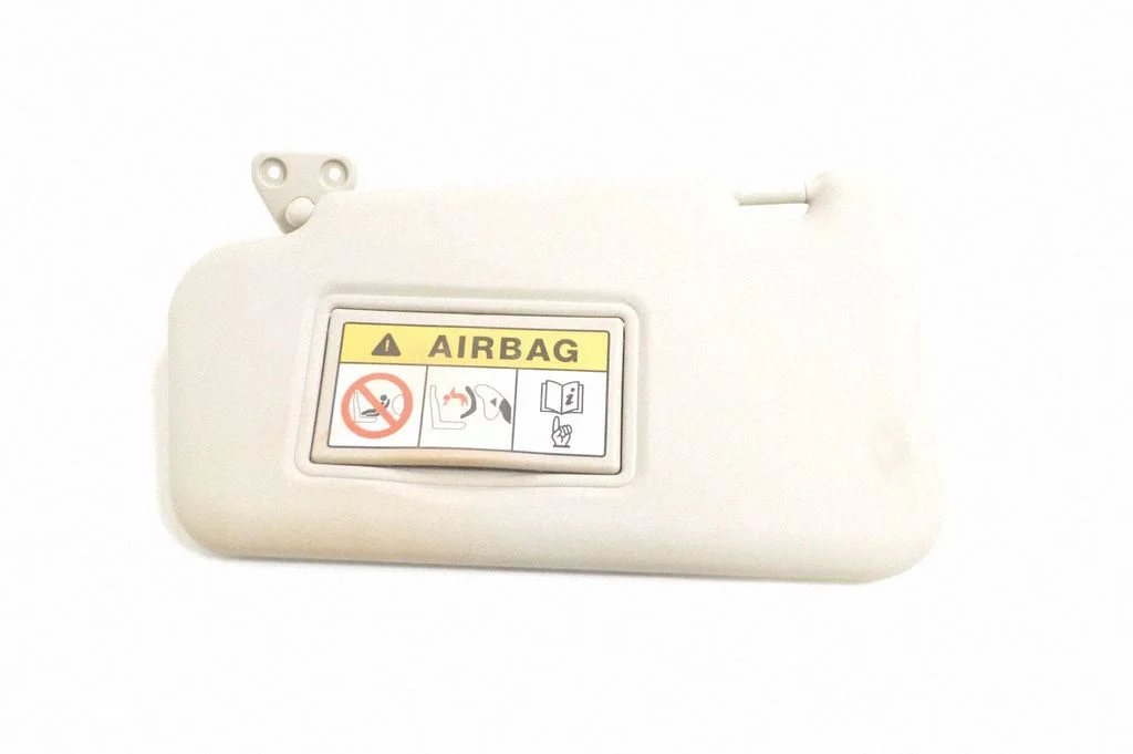Sun visor – left