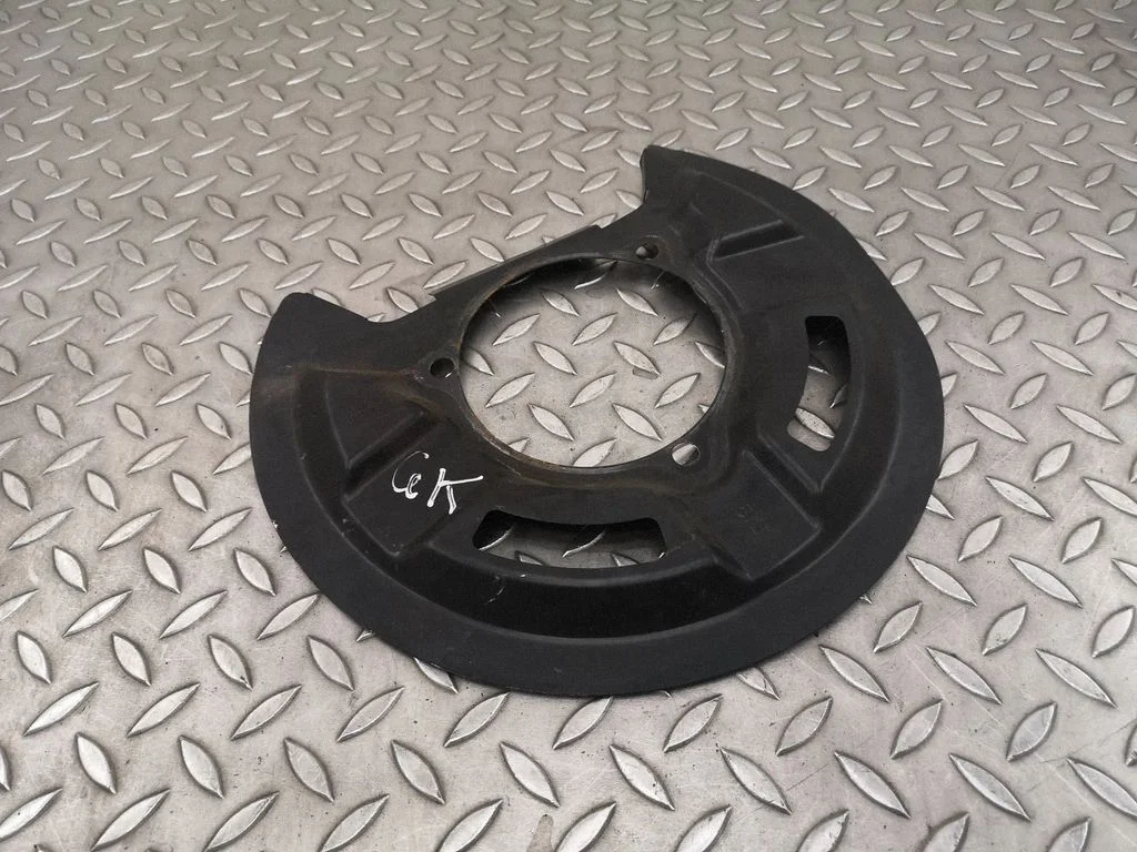 Tagumise piduriketta tolmukaitse – vasak
