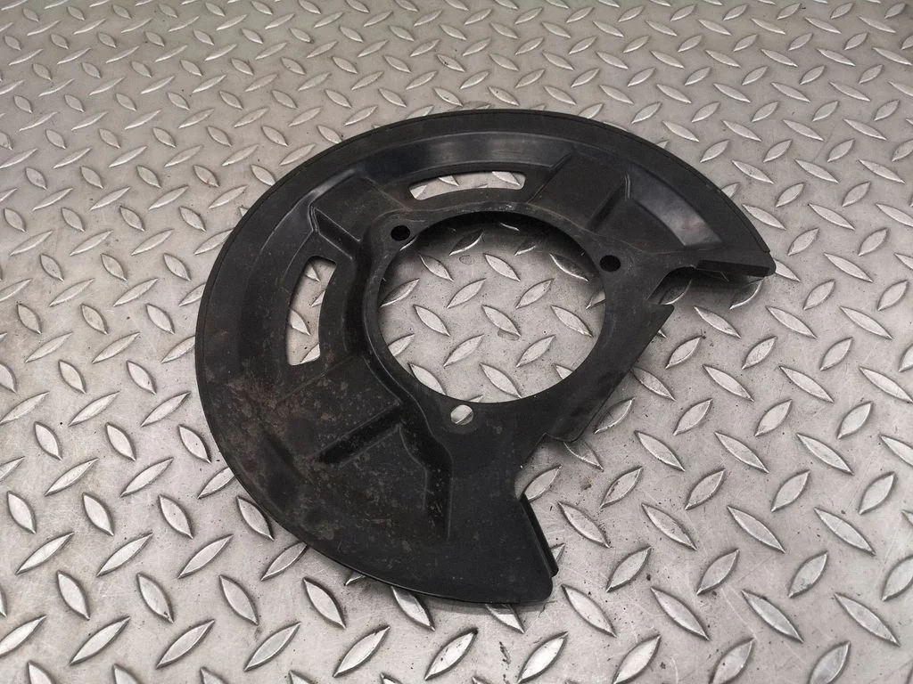 Tagumise piduriketta tolmukaitse – vasak