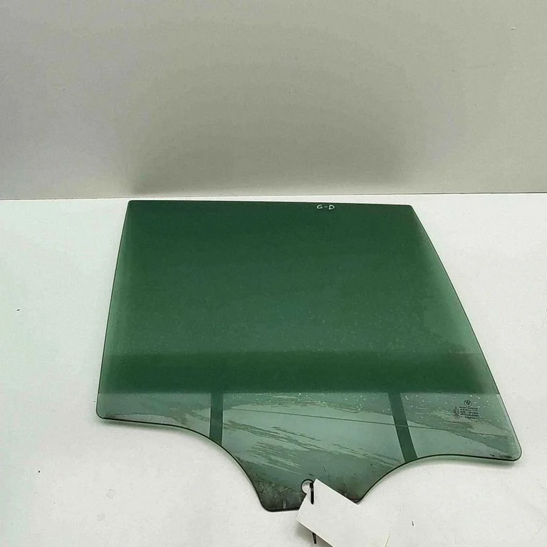 Rear door window glass 7329334