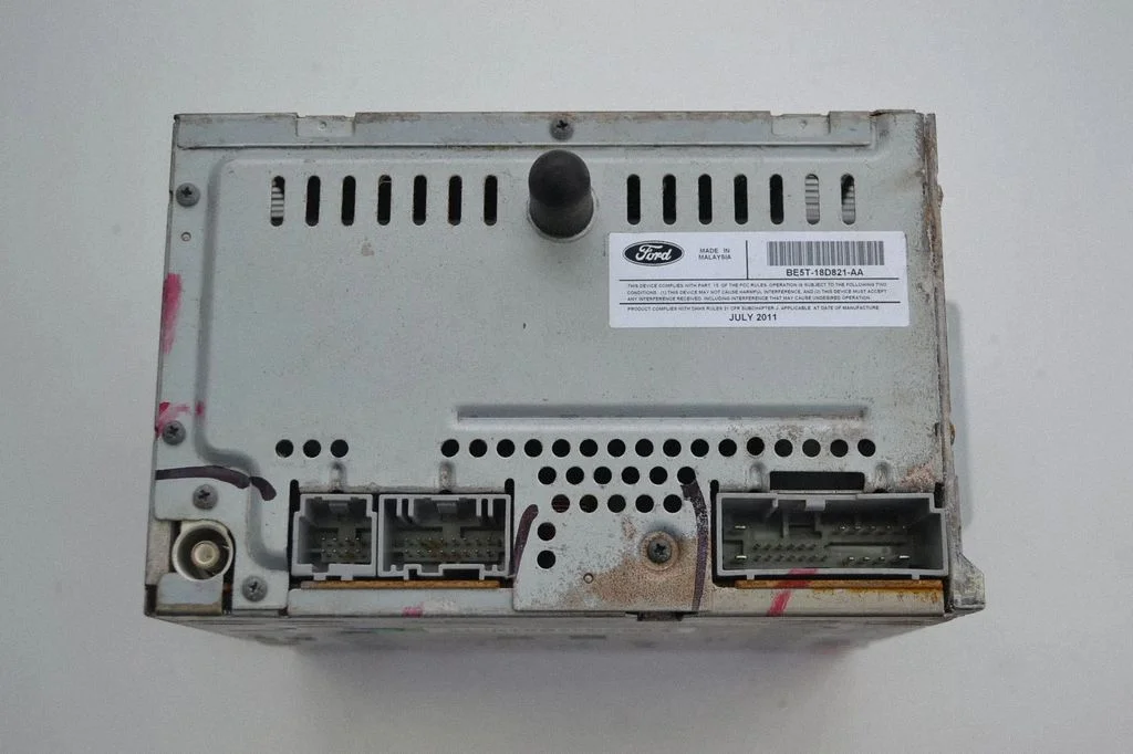 Radio/CD/DVD/GPS head unit BE5T18D821AA – Ford Fusion (2006-2012)