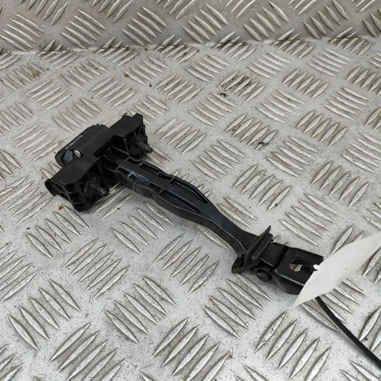 Front door check strap stopper 8491955