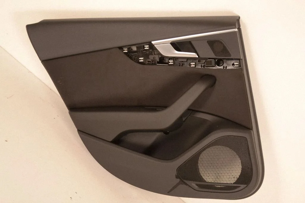 Rear door card panel trim – left