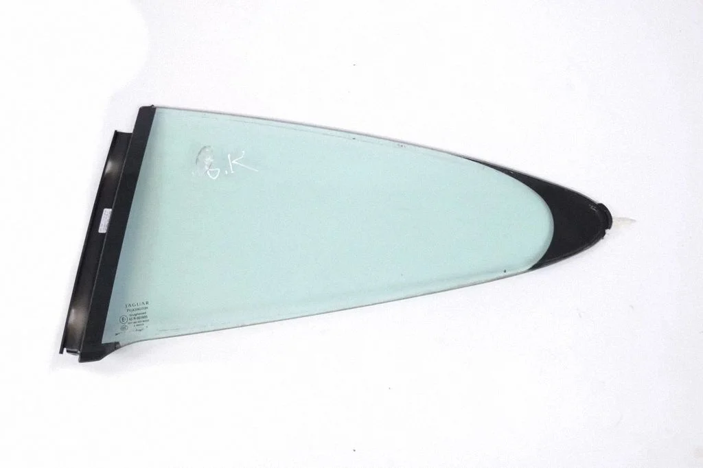 Rear side window – left