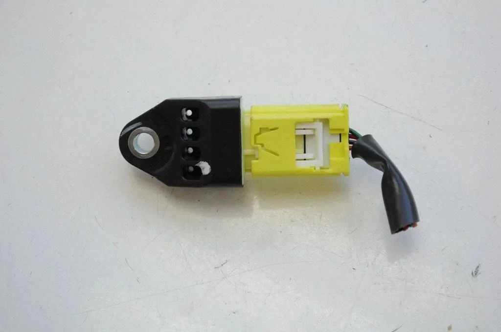 Drošības spilvenu trieciena sensors 98235AJ000