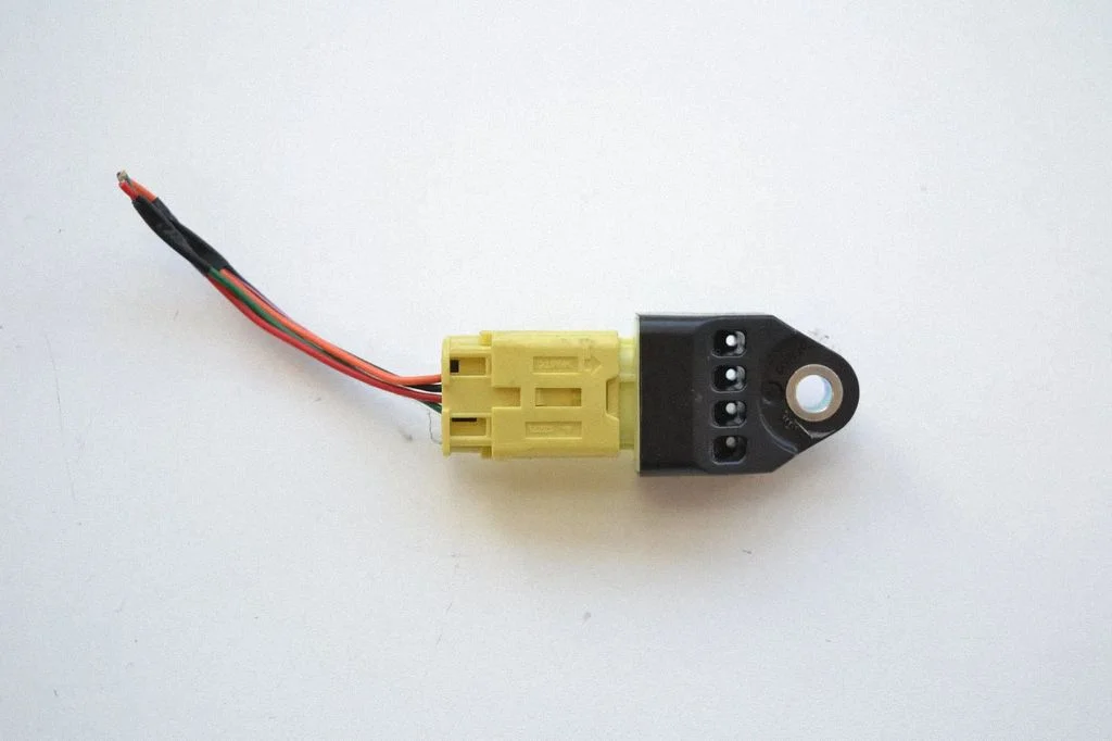 Drošības spilvenu trieciena sensors 98235AJ000