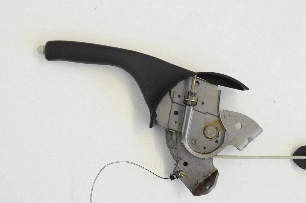 Hand brake release handle