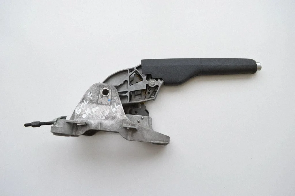Hand brake release handle 1J0947561