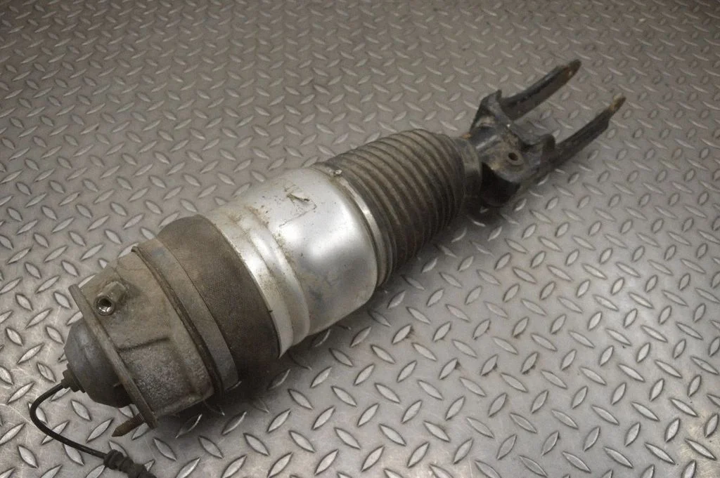 Air suspension front shock absorber – left