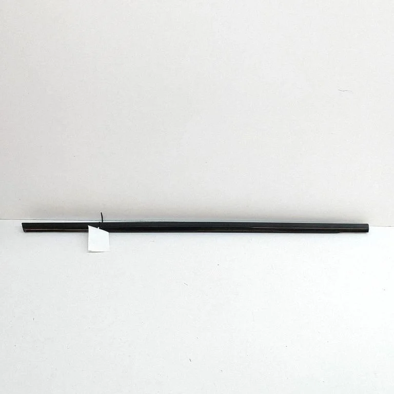 Front door glass trim molding DK6221453AA