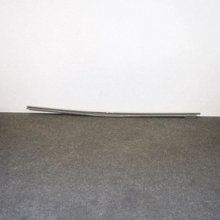 Front door glass trim molding – left