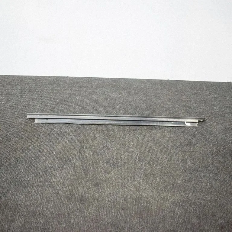Rear door glass trim molding 7404198